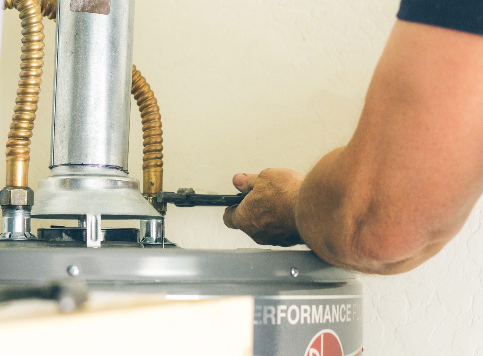 Water heater being installed